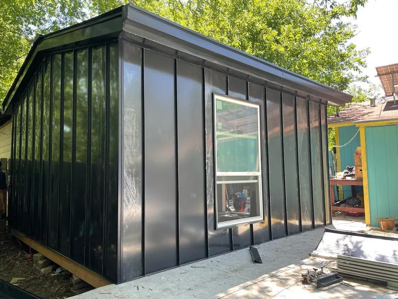 Black standing seam metal wall panels for Metal Roof Installation in Haysville